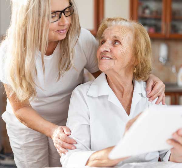 Eldery mother talking with her daughter